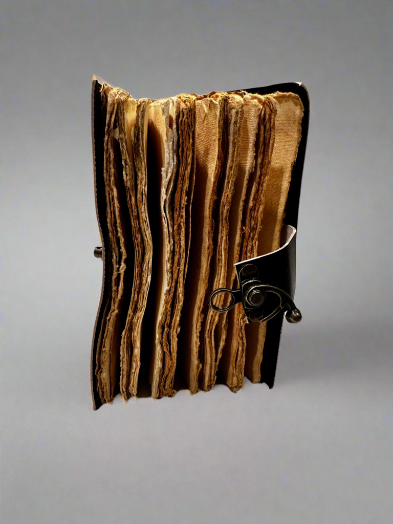Inside pages of Hekate journal showing high-quality paper for spell recording