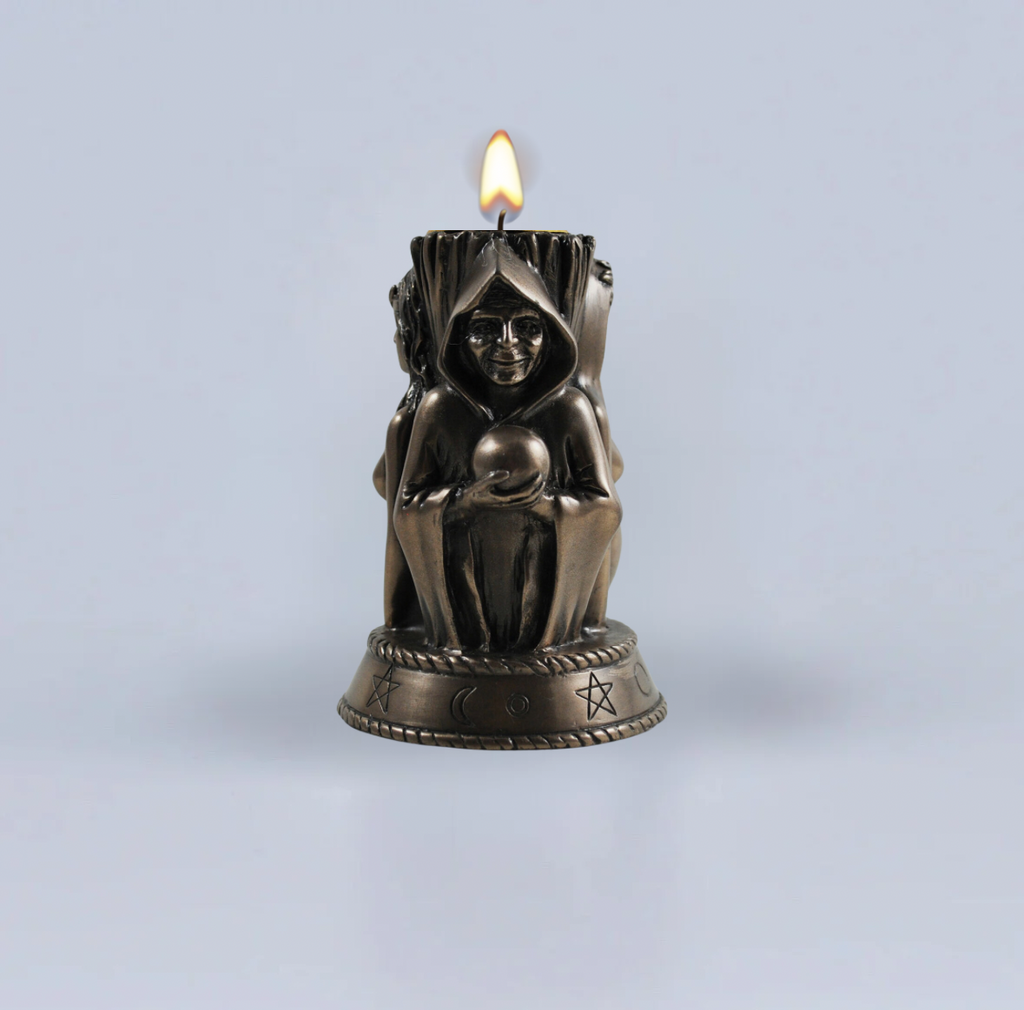 Hekate ritual candle with triple goddess imagery for protection spellwork